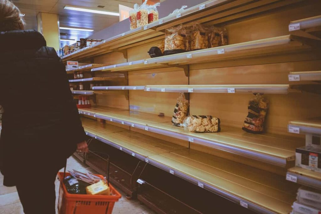 consumer behavior COVID panic buying empty shelves in grocery 